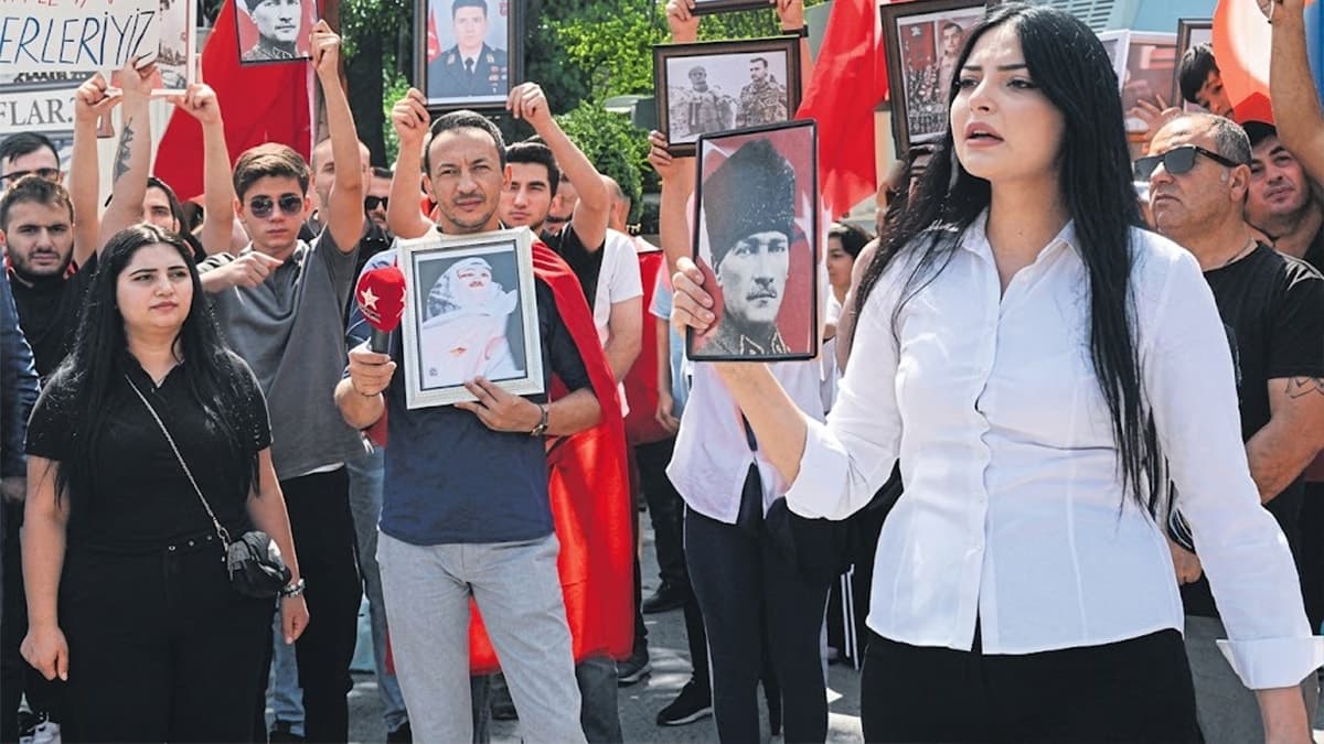 Terörist fotoğrafını yırttığı için gözaltına alınmak istendi