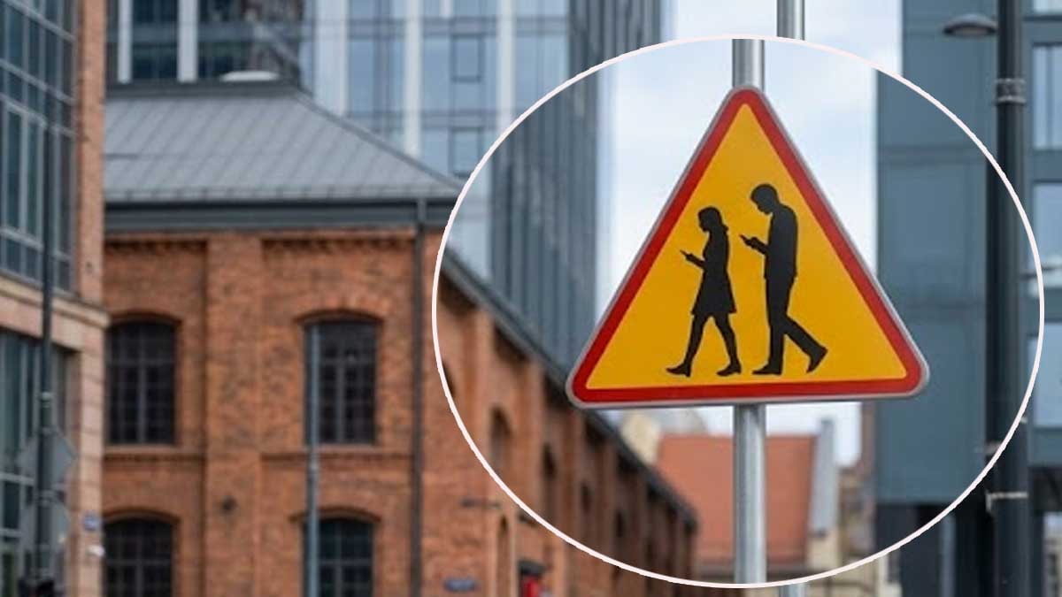 Telefonla yürüyenlere yeni dönem: Bu tabelayı gören kulaklığını, telefonunu bırakacak